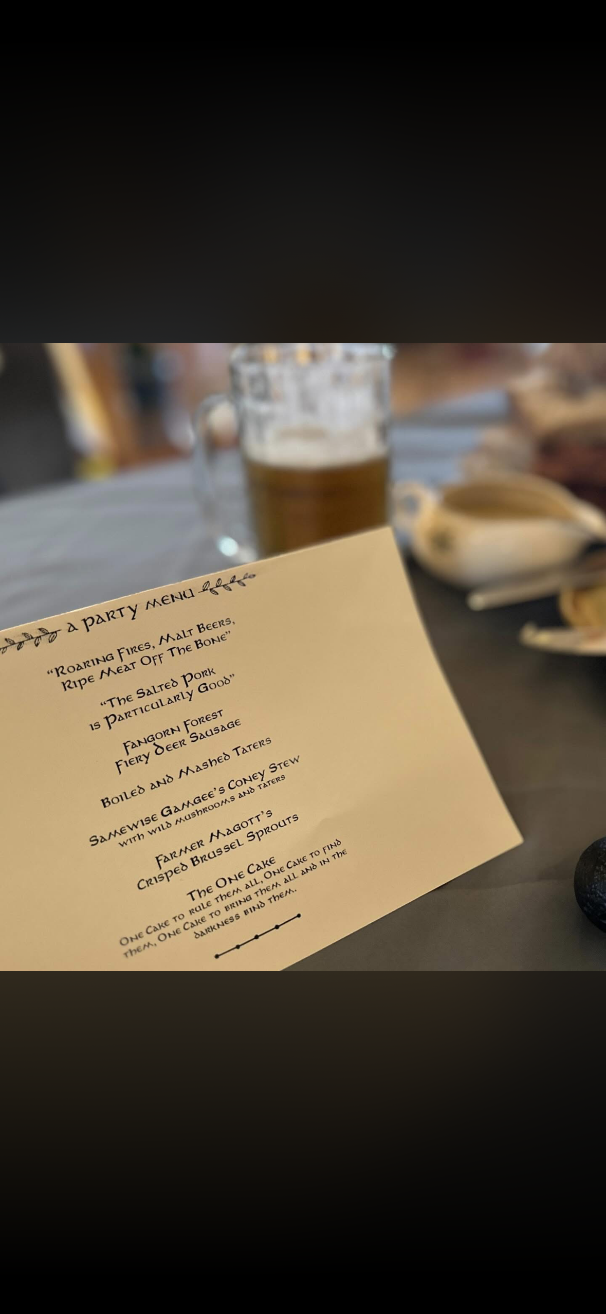 Handwritten menu of hobbitish dishes served at the birthday party